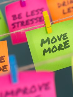 Colorful Post-It notes featuring positive weight-loss tips